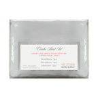 Luxury hotel-style bed sheets styled in a clean and inviting bedroom