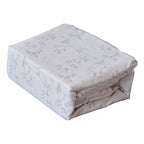 Folded printed sheet set neatly stacked to show pattern and fabric
