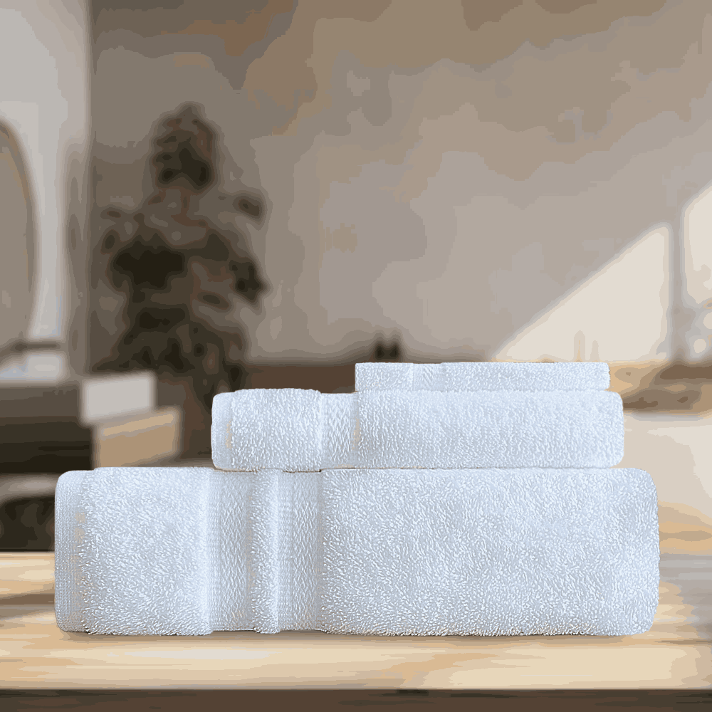Towels with cotton loops for enhanced softness and absorbance 