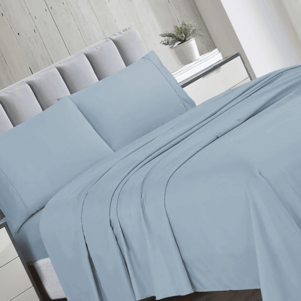 Complete microfiber bed sheet set displayed on a bed with smooth, wrinkle-resistant finish
