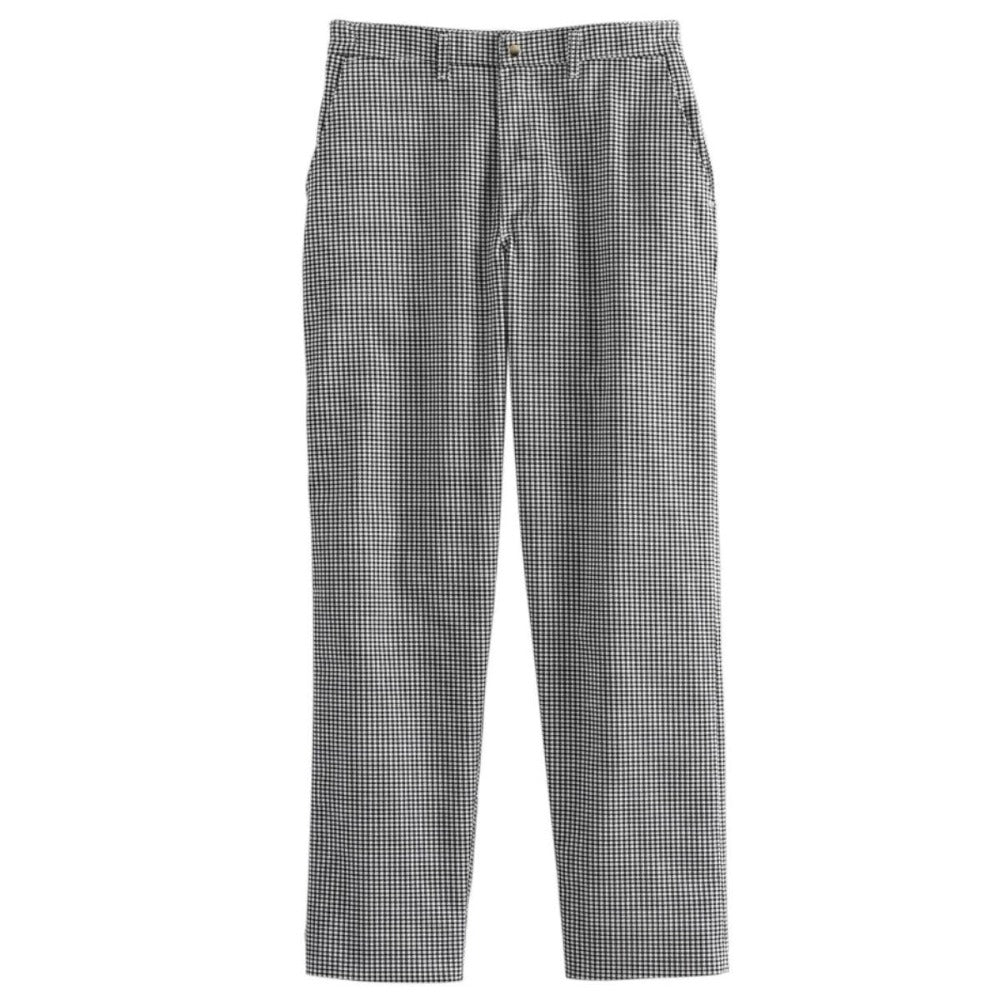 Classic chef trousers featuring a comfortable loose fit, moisture-wicking cotton blend material, and flat front with belt loops
