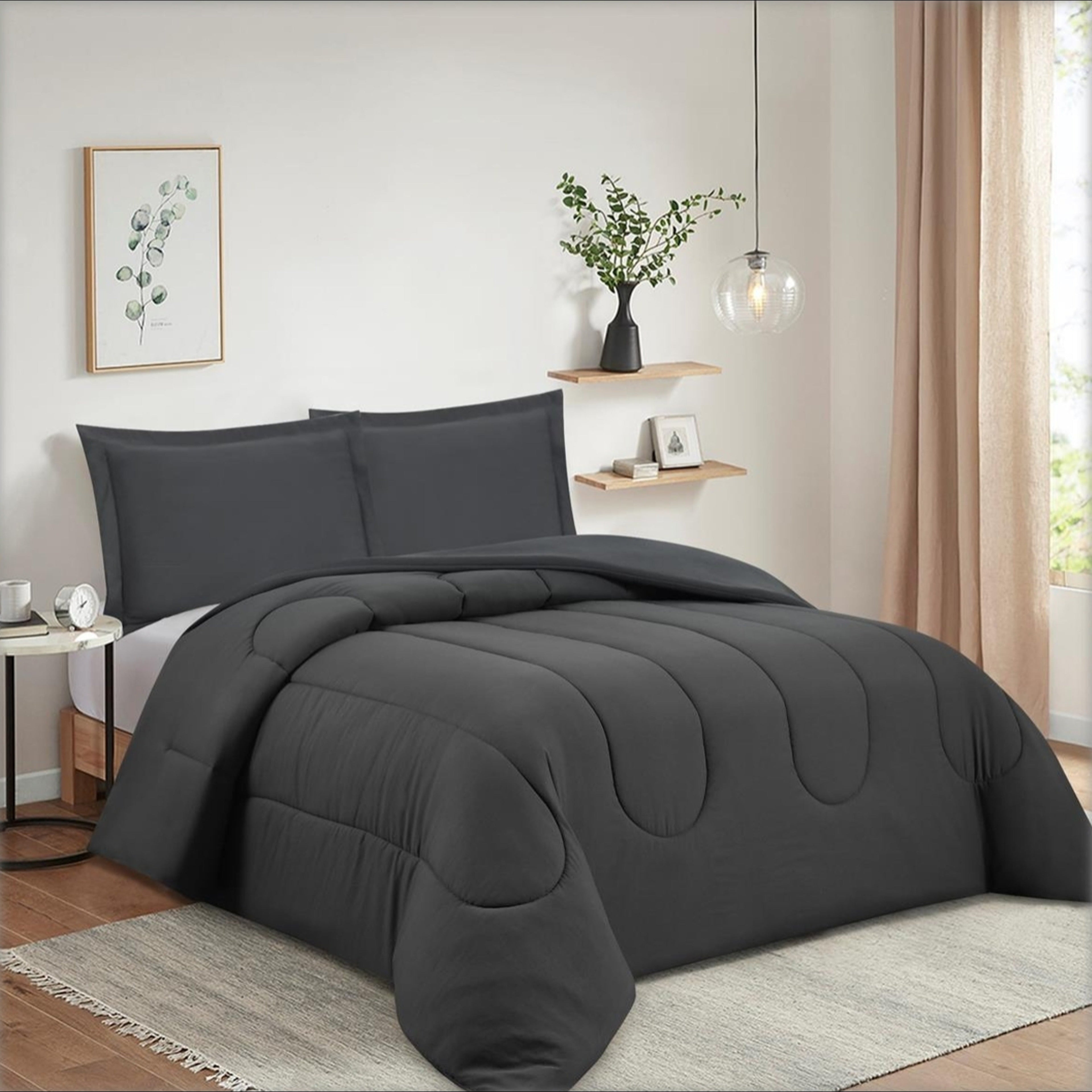 Soft microfiber down alternative comforter styled in a modern bedroom black