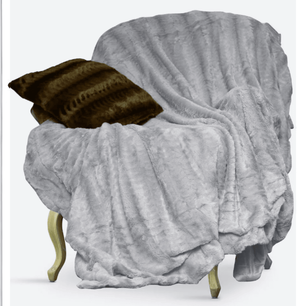 Lightweight faux fur throw blanket designed for everyday comfort and warmth Grey on Chair