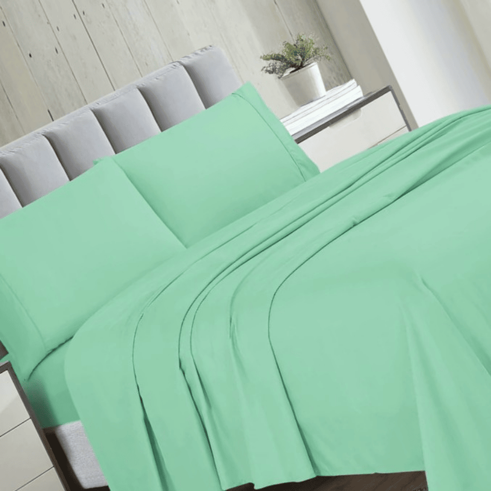 Elastic fitted microfiber bed sheet designed for a secure and snug mattress fit Sea foam
