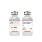 Shampoo with aloe vera, avocado oil, and honey for gentle cleansing and deep moisture