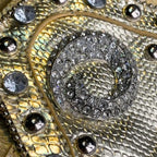 Fashionable small faux leather purse designed with decorative gem accents