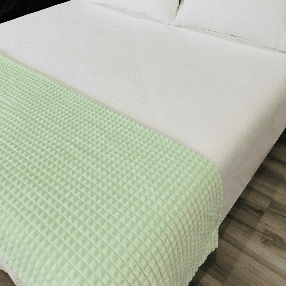 Elegant velour fleece blanket creating a warm and sophisticated bedroom atmosphere