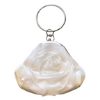 White rose flower purse with decorative floral embellishments and wrist ring handle