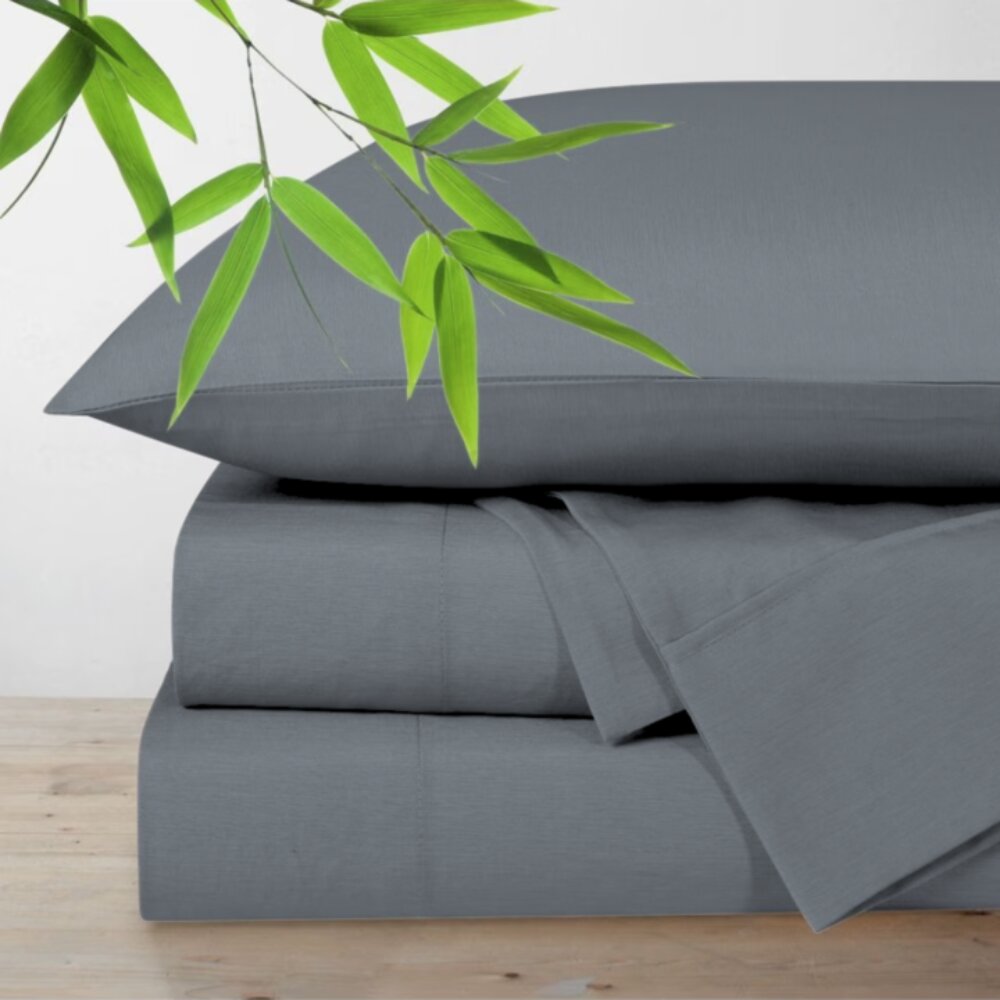 Bamboo blend bed sheets styled on a bed for a soft and inviting sleep experience Charcoal Grey