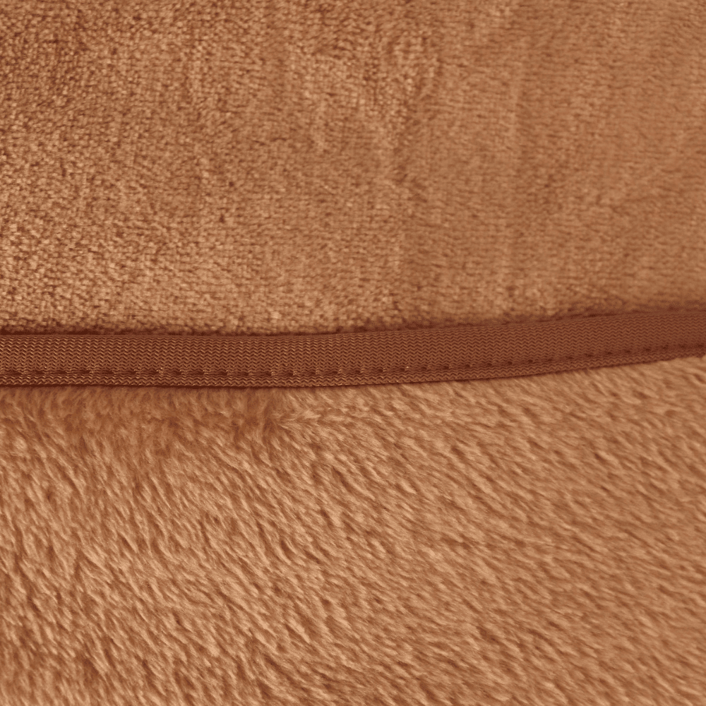 Close-up of velour fleece blanket texture in sand color, showing plush softness and high-quality finish.