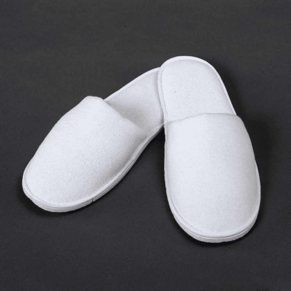White closed toe slippers for cozy indoor wear